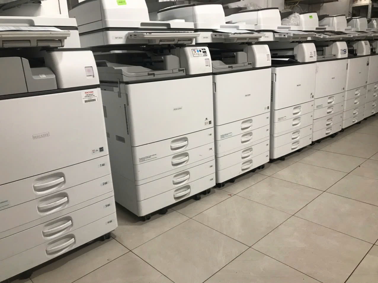 Máy photocopy - Công Ty TNHH Đầu Tư Và Phát Triển Dịch Vụ Quang Minh